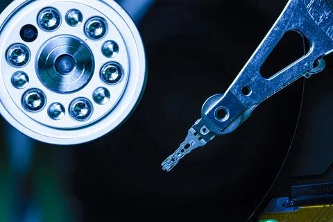 Close-up of hard disk drive reading data: modern technology in computing 스톡 사진