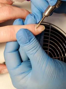 Close-up of the hardware manicure process in a beauty salon Stock Photos