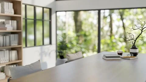 A close-up of a hardwood dining table or dining table in a modern bright room Stock Illustration