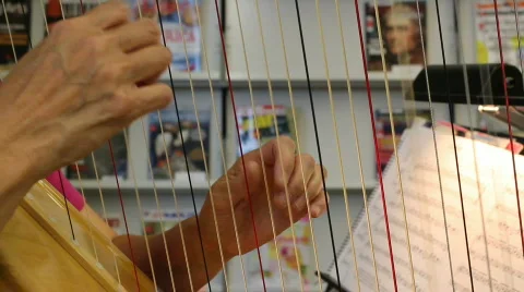Close up of a harp being played Stock Footage 763509