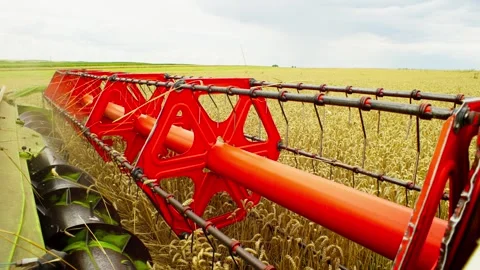 Close-up of the harvester of a large combine during operation. Stock Footage 274193879