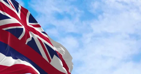 Close up of Hawaii state flag waving on a clear day Stock Footage 304989501