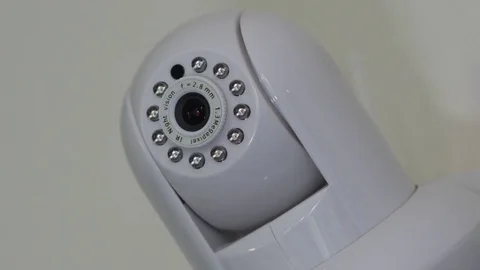 Close up of a HD home security camera moving around Stock Footage 79550805