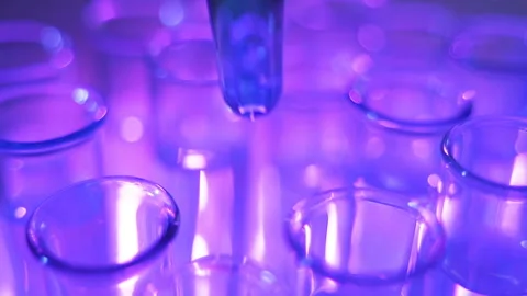 Close up HD video of scientist putting drops of chemical into test tube Stock Footage 123208068