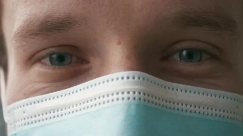 Close up head portrait young serious cautious man employee. Self care worker Stock Footage 146019505