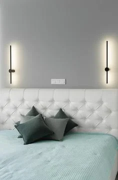 Close-up of the headboard of the bed is in an elegant modern bedroom Stock Photos