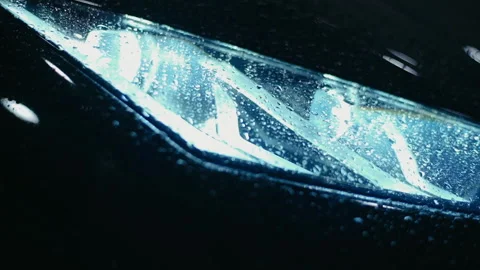 Close-up of headlights burning at night. Burning car headlight. Stock Footage 165806667