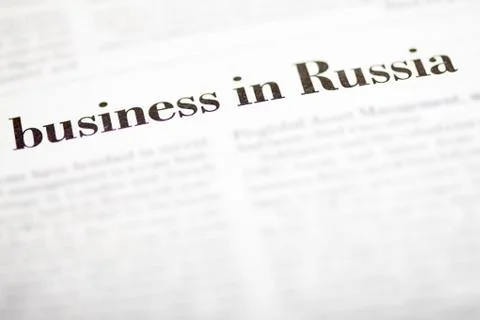 Close-up of headline from business newspaper article Stock Photos