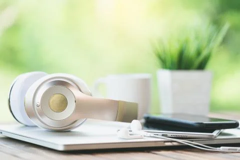 Close up headphone device on desk Stock Photos