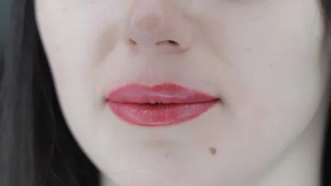 Close-up of healed permanent lip makeup on woman. A close-up image of a womans Stock Footage 311303224