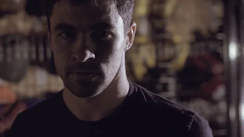 Close-up of healthy strong man working out in boxing studio. Stock-Footage 76915548