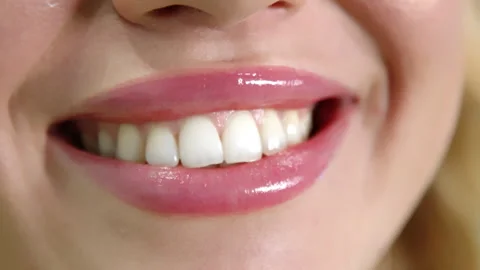 Close up of healthy white teeth of cheerful young woman, Hollywood smile Stock Footage 259741099