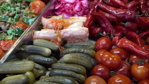 Close-up heaps of pickles, tomatoes and other vegetables Stock Footage 101865789