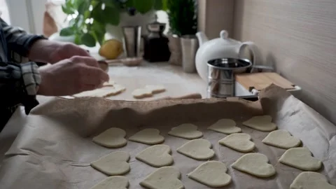 Close up of a heart cookie on a baking sheet Stock Footage 147211416