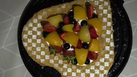 Close-up of a heart-shaped cake viewed from above and rotating. birthday cake Stock Footage 167371715