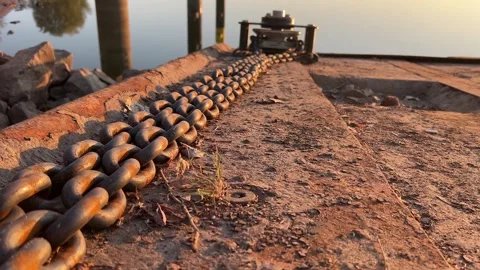 Close-up of heavy anchor chain and mooring mechanism on a ferry ramp Stock Footage 343701733