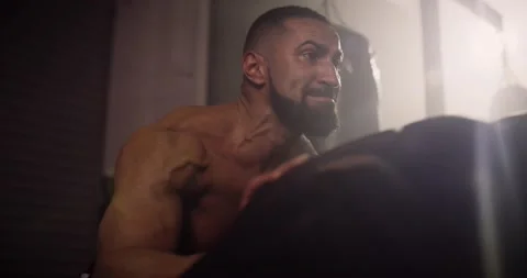 A Close-Up Of A Heavyweight Hispanic Bodybuilder Tyre Flipping In A Gym Stock Footage 158448685