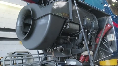 Close up of Helicopter engine inside hangar, showcasing modern aerospace Stock Footage 334653386