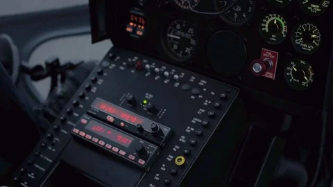 CLOSE UP: Helicopter flight control system, instrument panel, switches &amp; display Stock Footage 73304944
