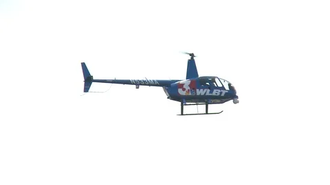 Close up of helicopter flying in clear sky, New Orleans, US Stock Footage 132396001