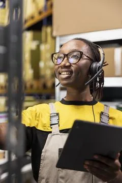Close up of help line worker responding to issues like parcels delays Fotos Stock