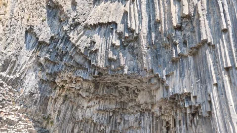 Close-up of hexagonal basalt columns in rocky terrain Stock Footage 341776110