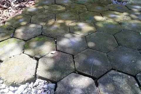 Close-up of hexagonal stone paving in a garden path Stock Photos