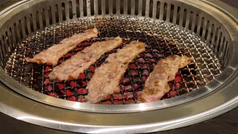 Close up , high angle of cooking a fillet meat at restaurant Stock Footage 257874094