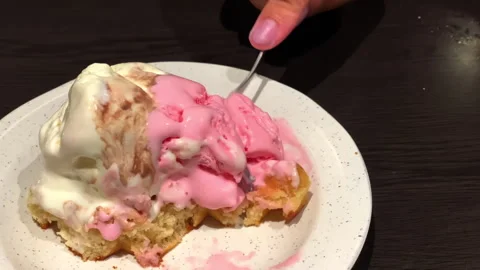 Close up high angle of a people picking a ice cream waffle in 4k footage Stock Footage 257872225