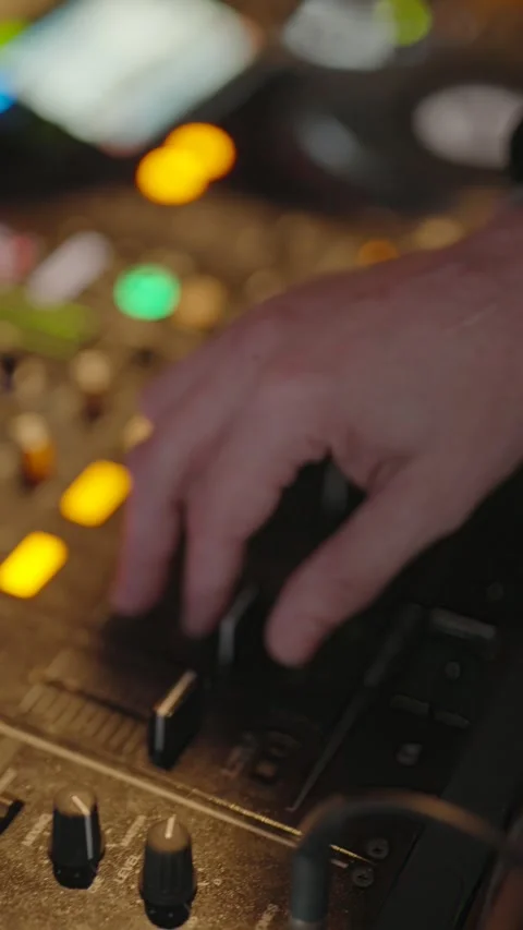 This is a close-up, high-angle shot capturing a DJ Stock Footage 329915011