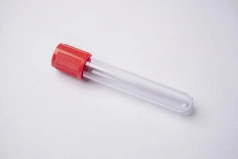 Close-up, high-angle shot of a single empty medical blood collection tube w.. Stock Photos