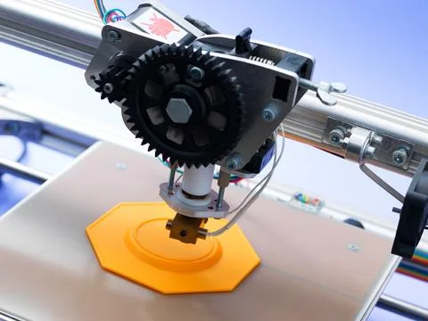 Close-up High Angle View of 3D Printer Head Extruding Plastic 写真素材