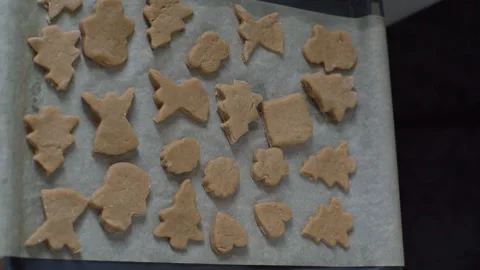 Close up high-angle view hands of unrecognizable young woman putting Christmas Stock Footage 228740732