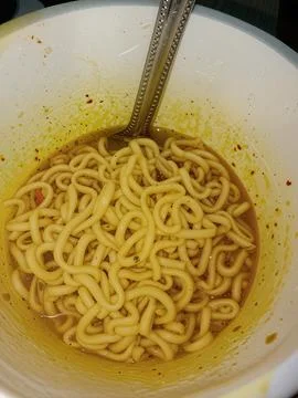 Close up high angle view of instant noodles in a white plastic cup Stock Photos