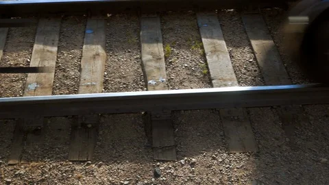 Close-up: High angle view of moving train on railroad track - Ulaanbaatar, Stock Footage 117686686