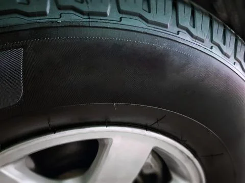 Close-up High Section of New Tire with Selective Focus Stock Photos