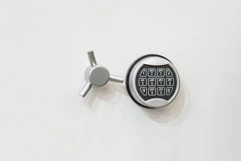 Close-up of a high-security electronic safe lock mechanism mounted on a whi.. Stock Photos