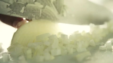 Close in High speed of onion being chopped Stock Footage 50713799