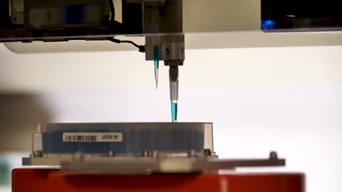 Close-up of high tech bio-lab testing equipment operating Stock Footage 247092100