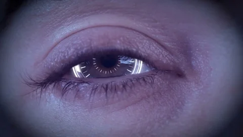 Close-up of high tech cyber eye with zoom into eye to black Stock Footage 79400636