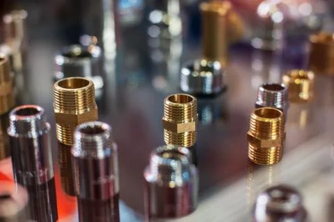 Close up high tech many kind of quick coupling brass metal connector equipment Fotos Stock