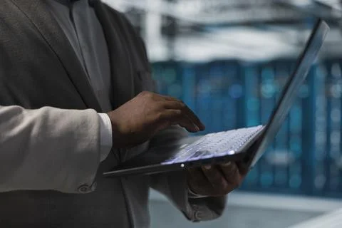 Close up of high tech server farm admin managing equipment systems Stock Photos