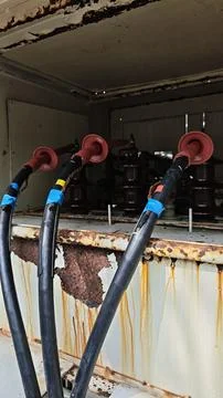 Close up of high voltage cable termination potheads with red silicone. Stock Photos