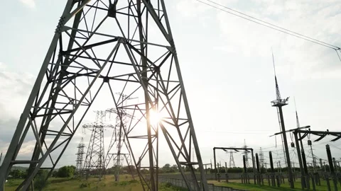 A close-up of high-voltage power lines against a Stock Footage 249700259