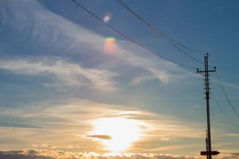 Close up of high voltage power lines on sunset background Stock Photos