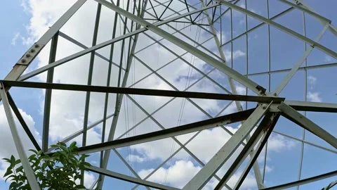 Close Up High Voltage Power Tower with Blue Sky and Clouds on Background Stock Footage 141383673
