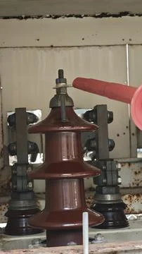 Close up of high voltage red cable termination lug connecting . Stock Photos