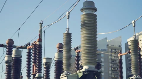 Close up, high voltage substation with tall pylons  Stock Footage 142591076
