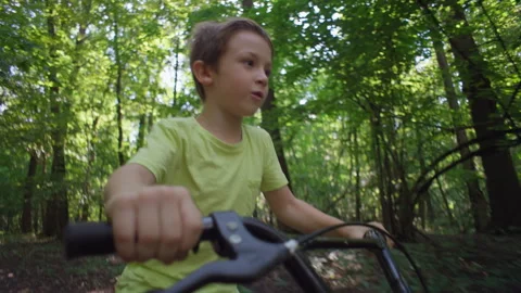 Close-Up of His Hands on the Handlebars While Embracing an Active Stock Footage 289728386