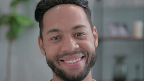 Close up of Hispanic Man Smiling at Home Video stock 293259252